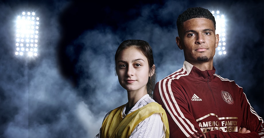 miles robinson with teen soccer player