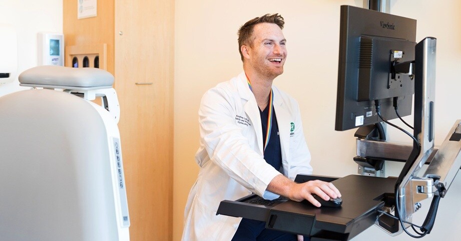 Dr. Lupo sitting at computer