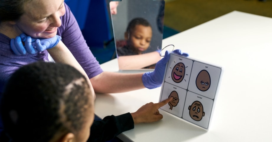 Child receiving technology assisted therapy