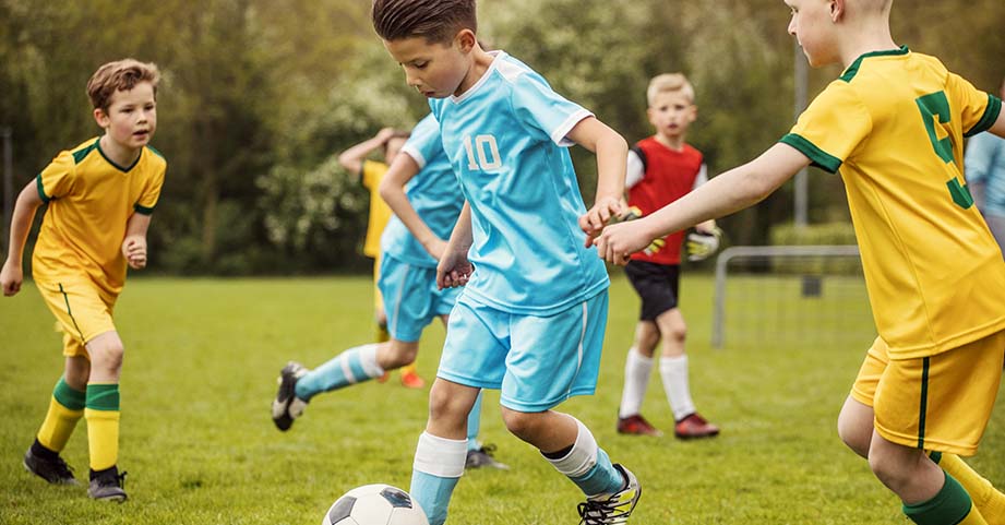 Boy playing soccer