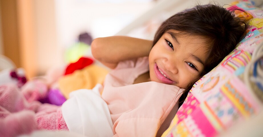 Girl smiling after successful pediatric kidney transplant