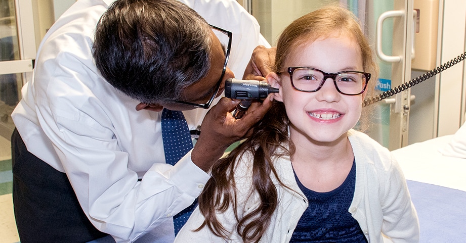 Pediatric crohns patient smiling with doctor