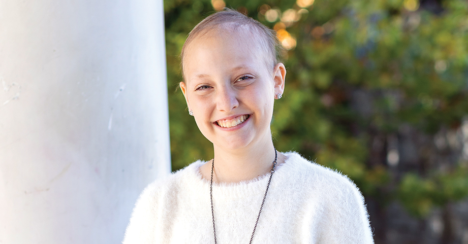 2022 Miracle Child Mary smiling in a park