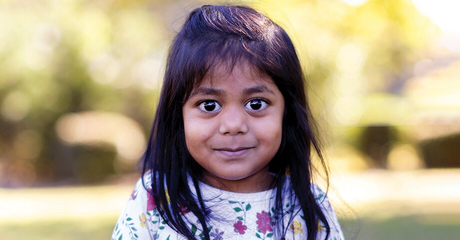 2022 miracle child patient smiling in garden