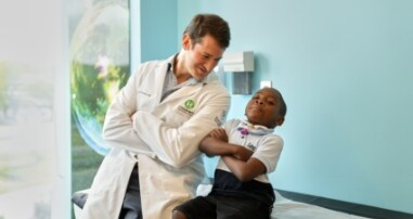 Physician playing with patient