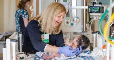 nurse with nicu patient
