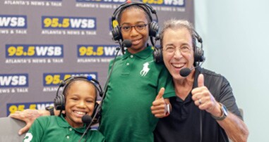 Clark Howard and kids at Care-a-thon
