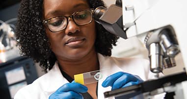 Emory Researcher working in lab