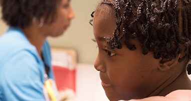 Girl at hematology appointment