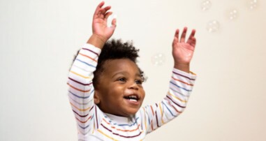 little boy laughing