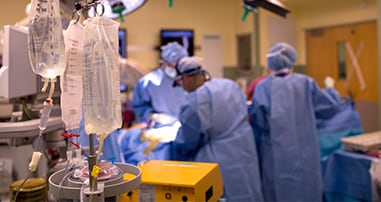 Pediatric surgeons in operating room