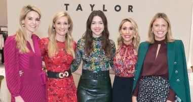 members of friends organization at annual fashion show fundraiser