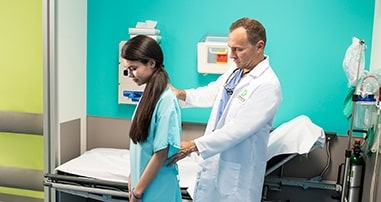 pediatric patient prepares for spine surgery