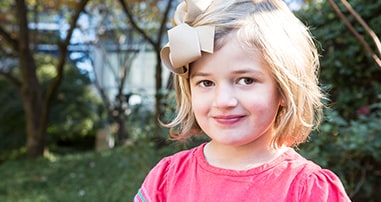 autism girl patient smiling in garden