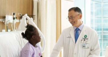Doctor examines child for heart health