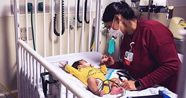 Nurse treating heart patient in the CACU