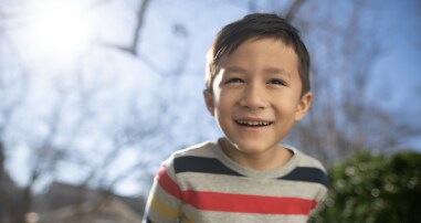 Healthy boy playing after a successful heart transplant