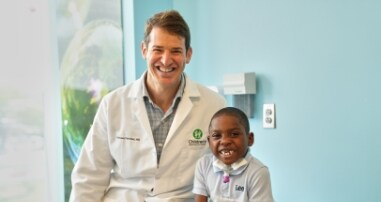 Dr. Fletcher with spine surgery patient