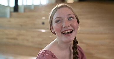 Young girl who had spine surgery smiling