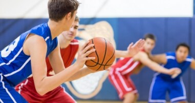 High school boys playing basketball 