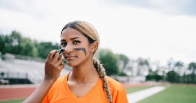 Teen wearing face paint