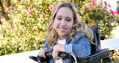 darby cerebral palsy smiling in wheelchair