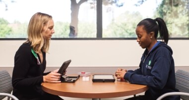 Clinician interviewing registry participant