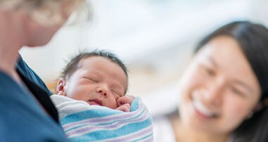 doctor and mother with newborn