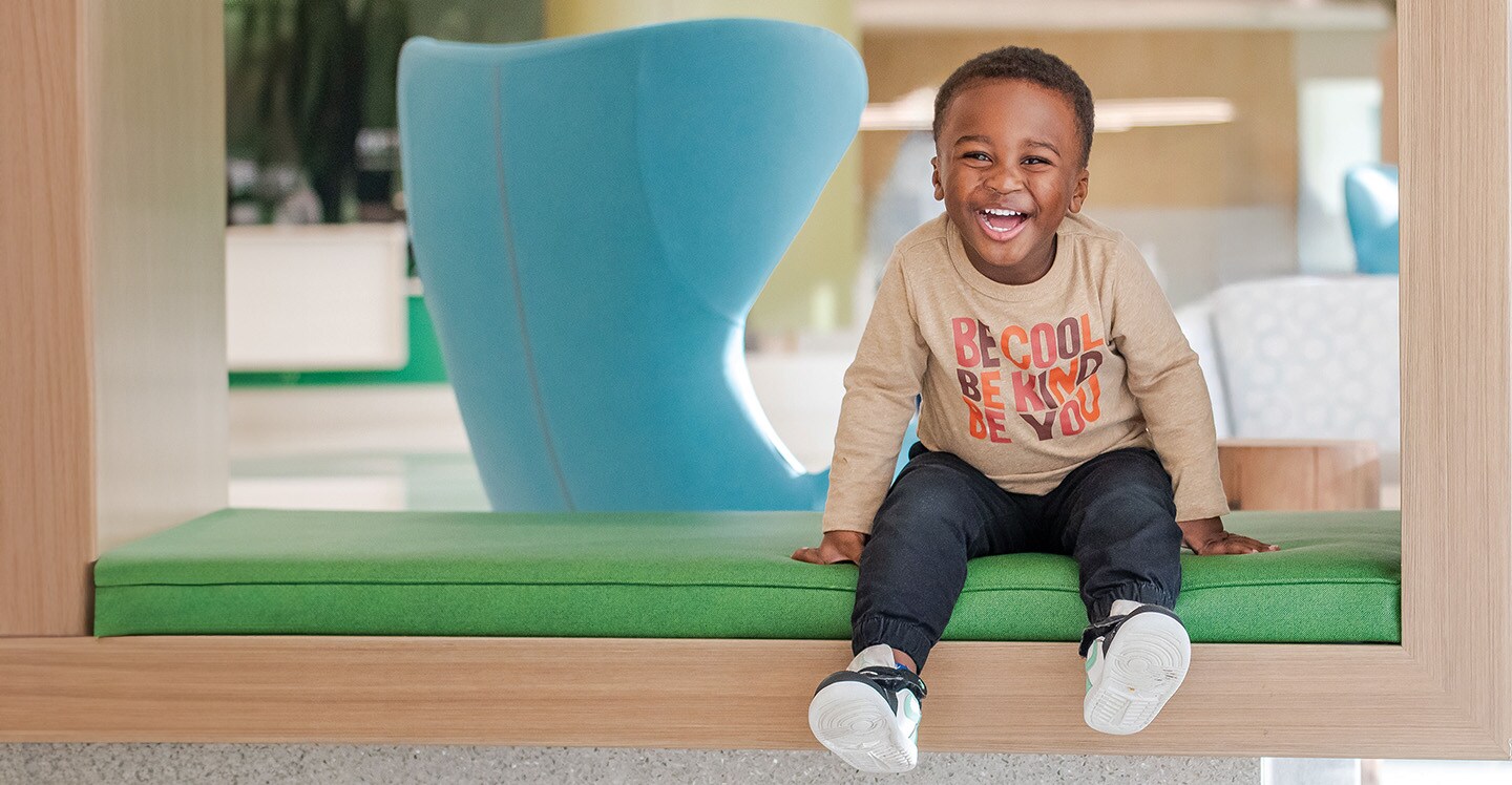 boy patient smiling in lobby