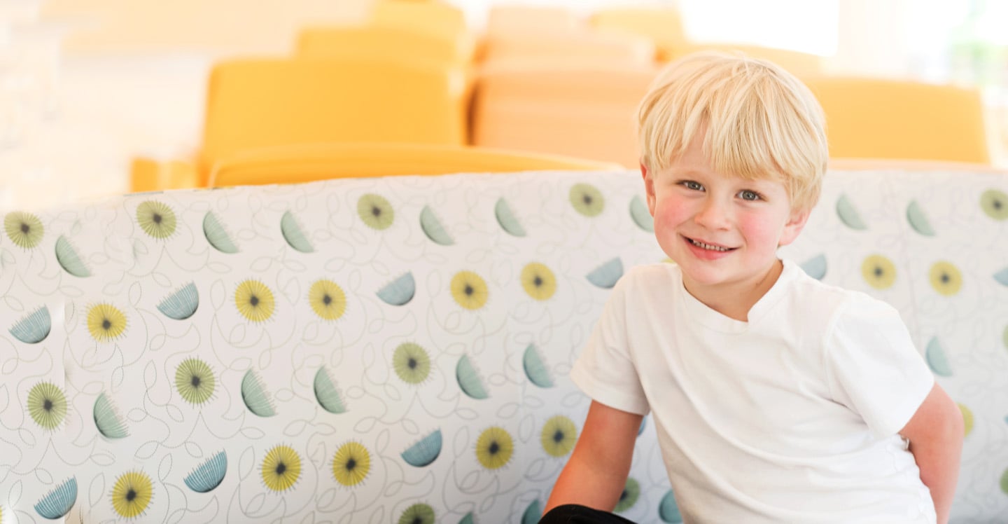 Patient-smiling-in-waiting-room