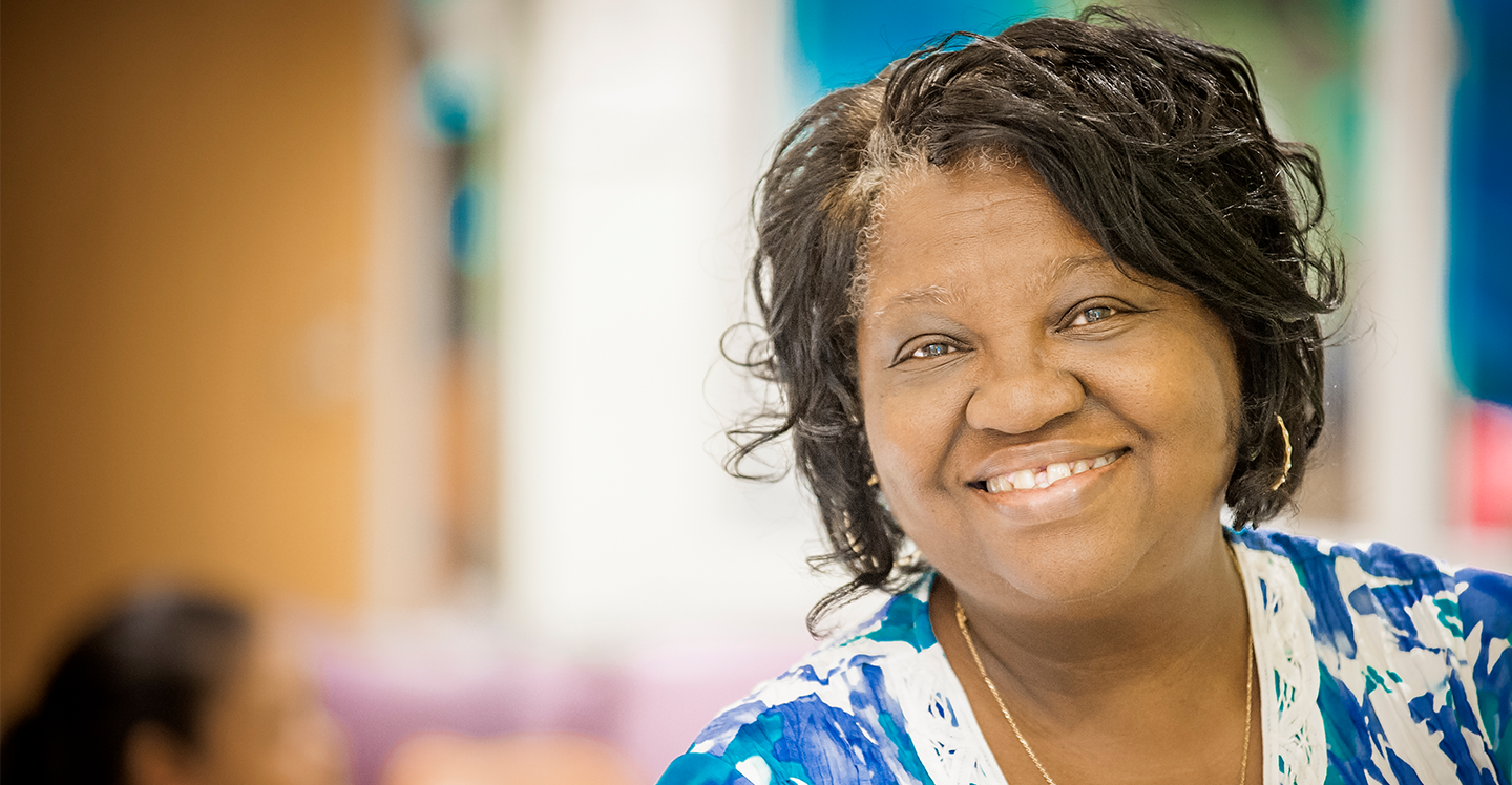 Children's nurse smiling in clinic