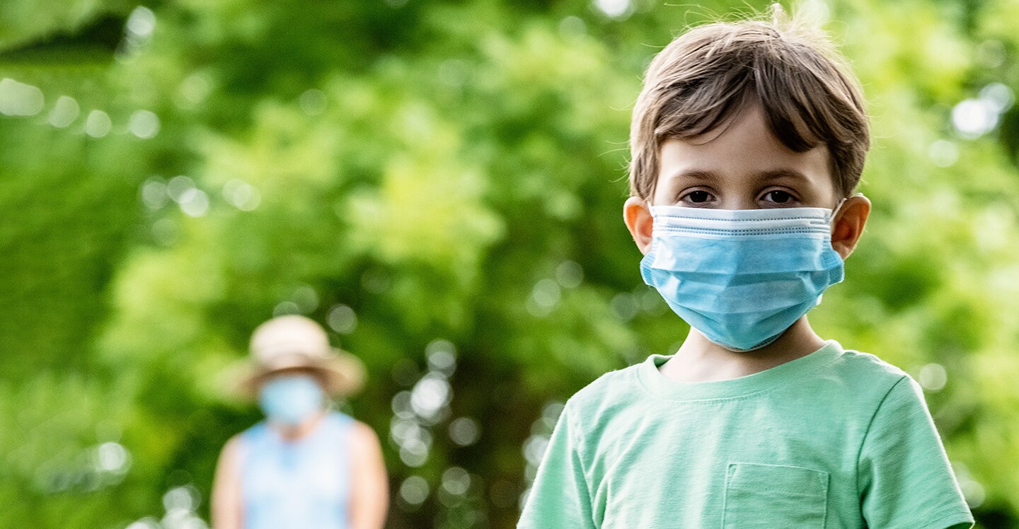 Boy wearing a mask