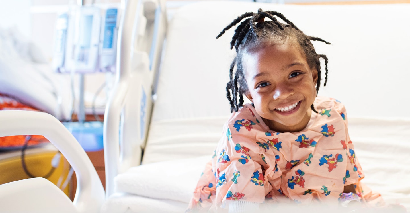 Sickle cell patient girl smiling at pediatric hospital