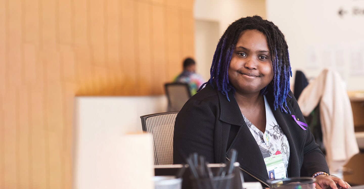 Children's employee at registration desk at the Center for Advanced Pediatrics