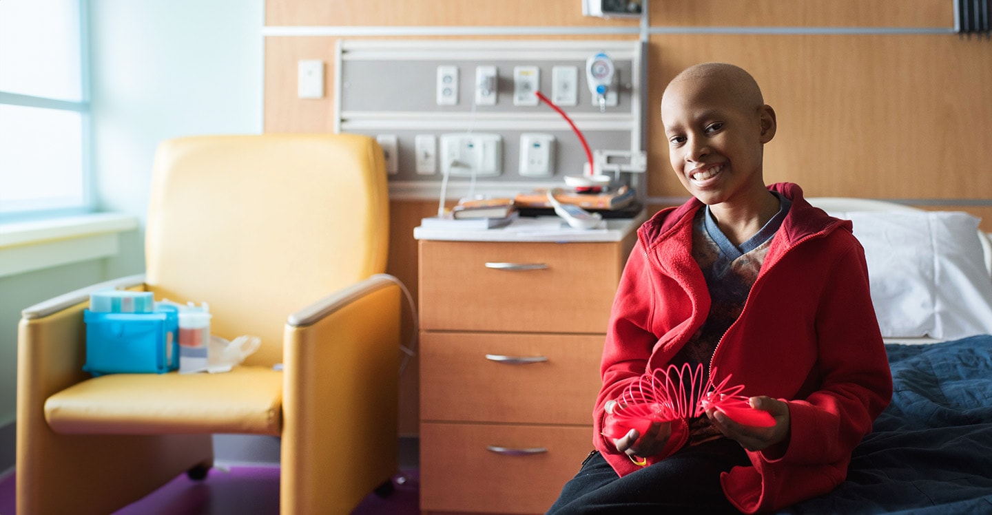 cancer patient on hospital bed with slinky