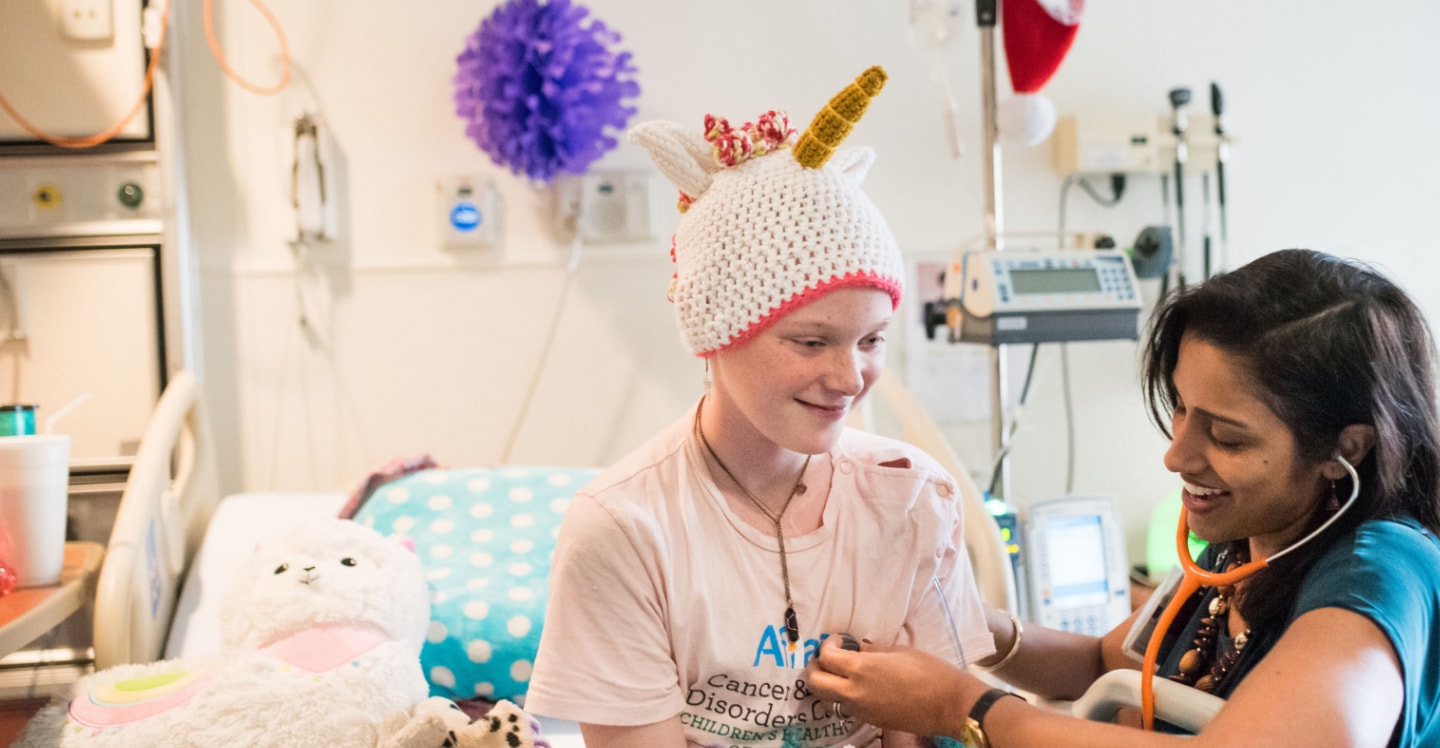 Cancer patient smiling with doctor