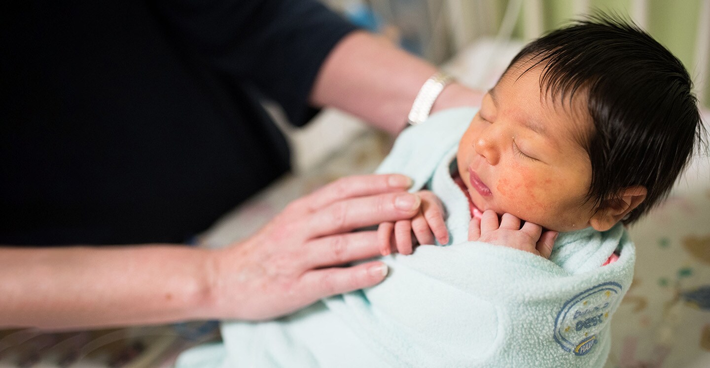 Baby wrapped in blanket