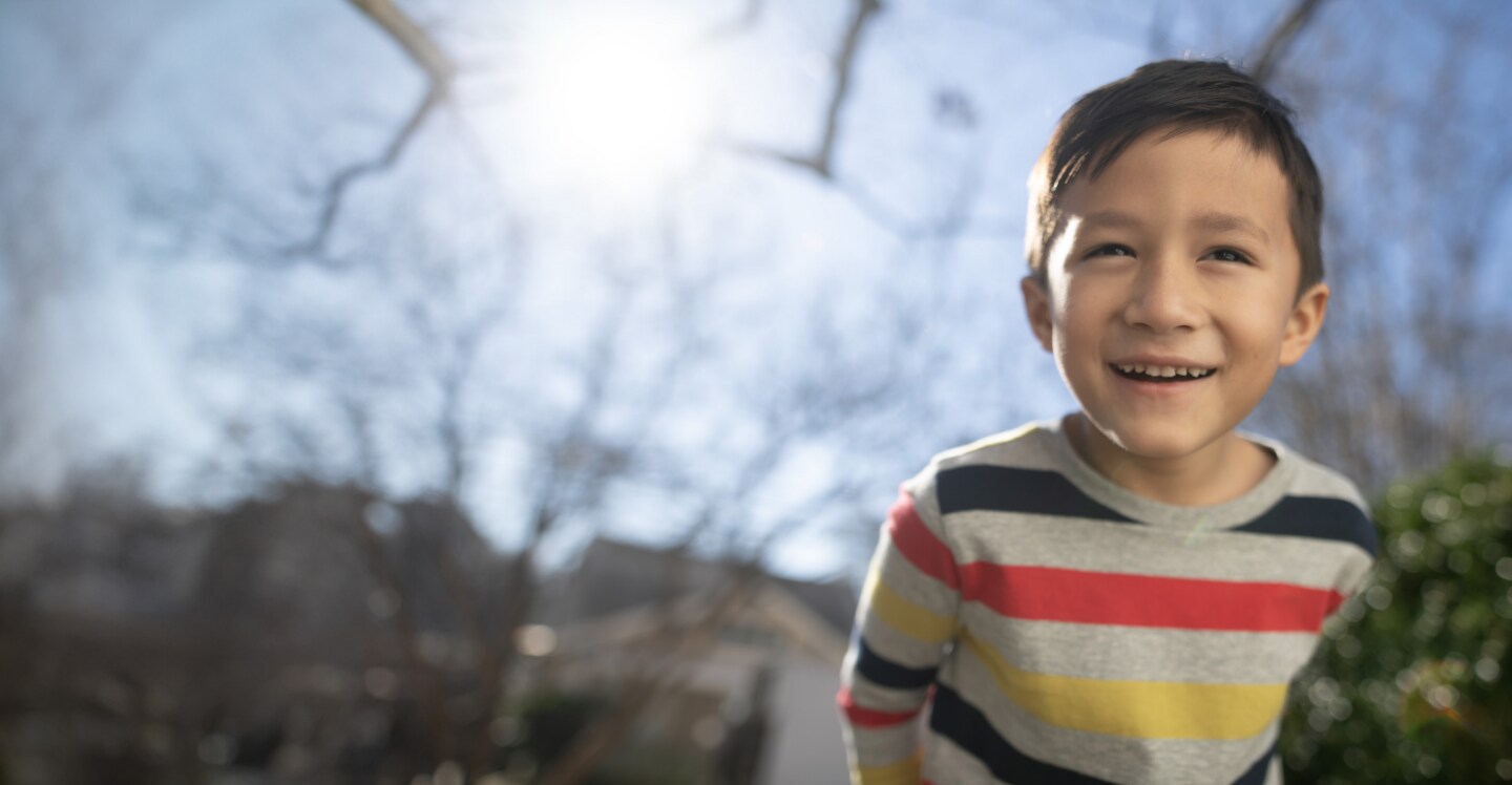 Healthy boy playing after a successful heart transplant