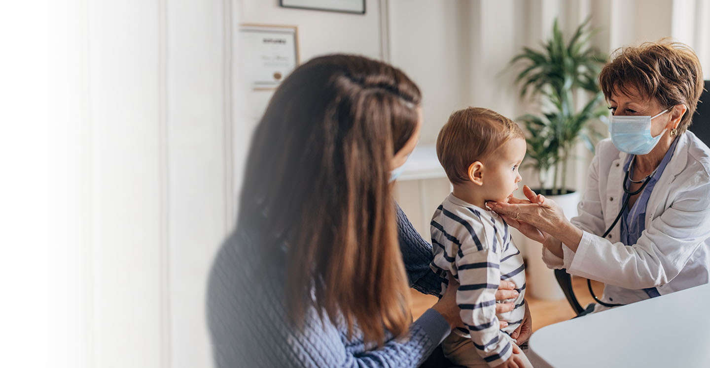 Boy with patient at pediatrician office