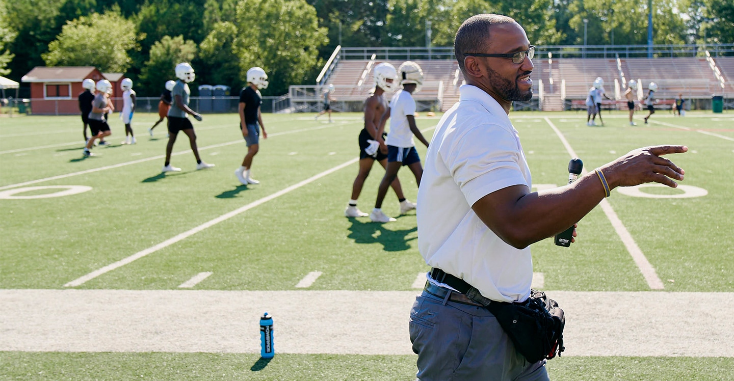 athletic trainer coaching high school football