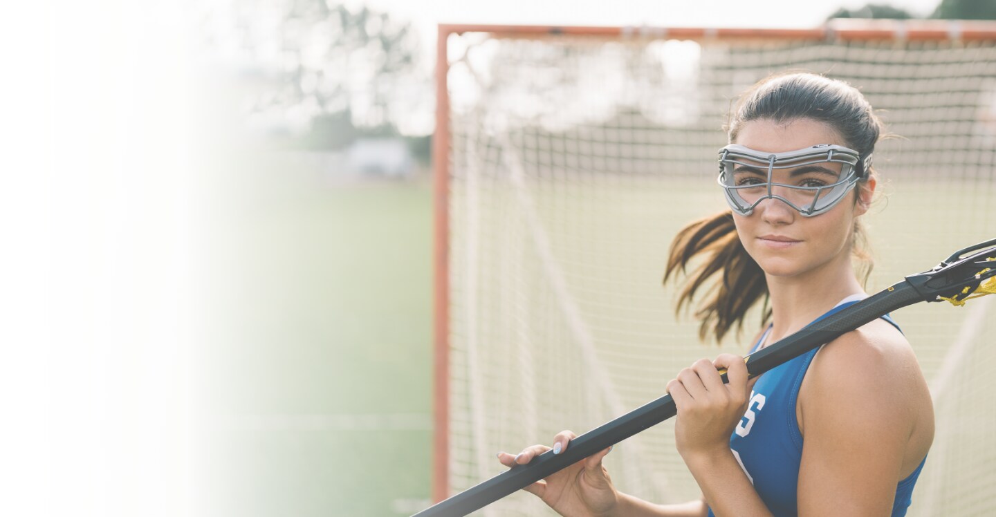girl playing lacrosse