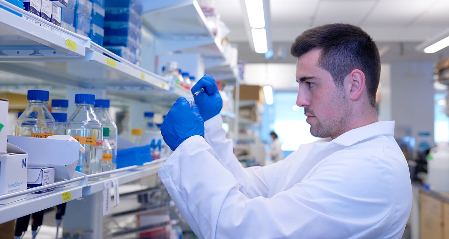 pediatric research doctor using pipette