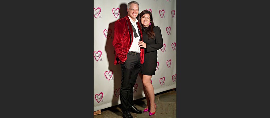 Couple posing at entry
