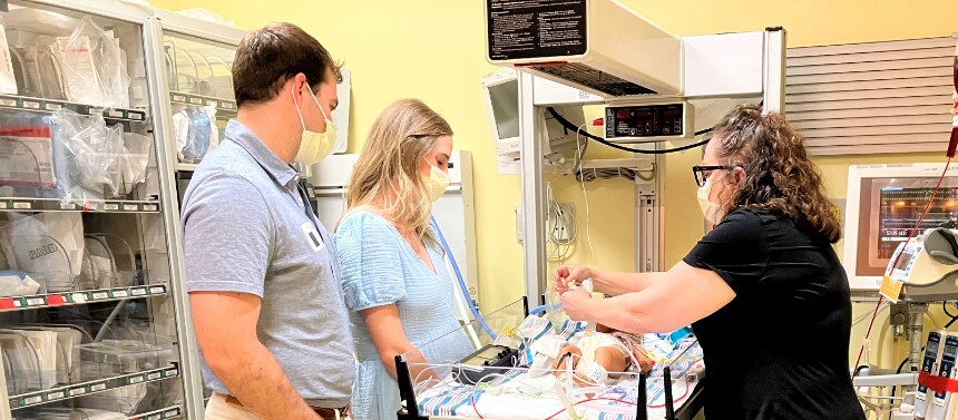 Fetal Cardiology nurse with parents and child