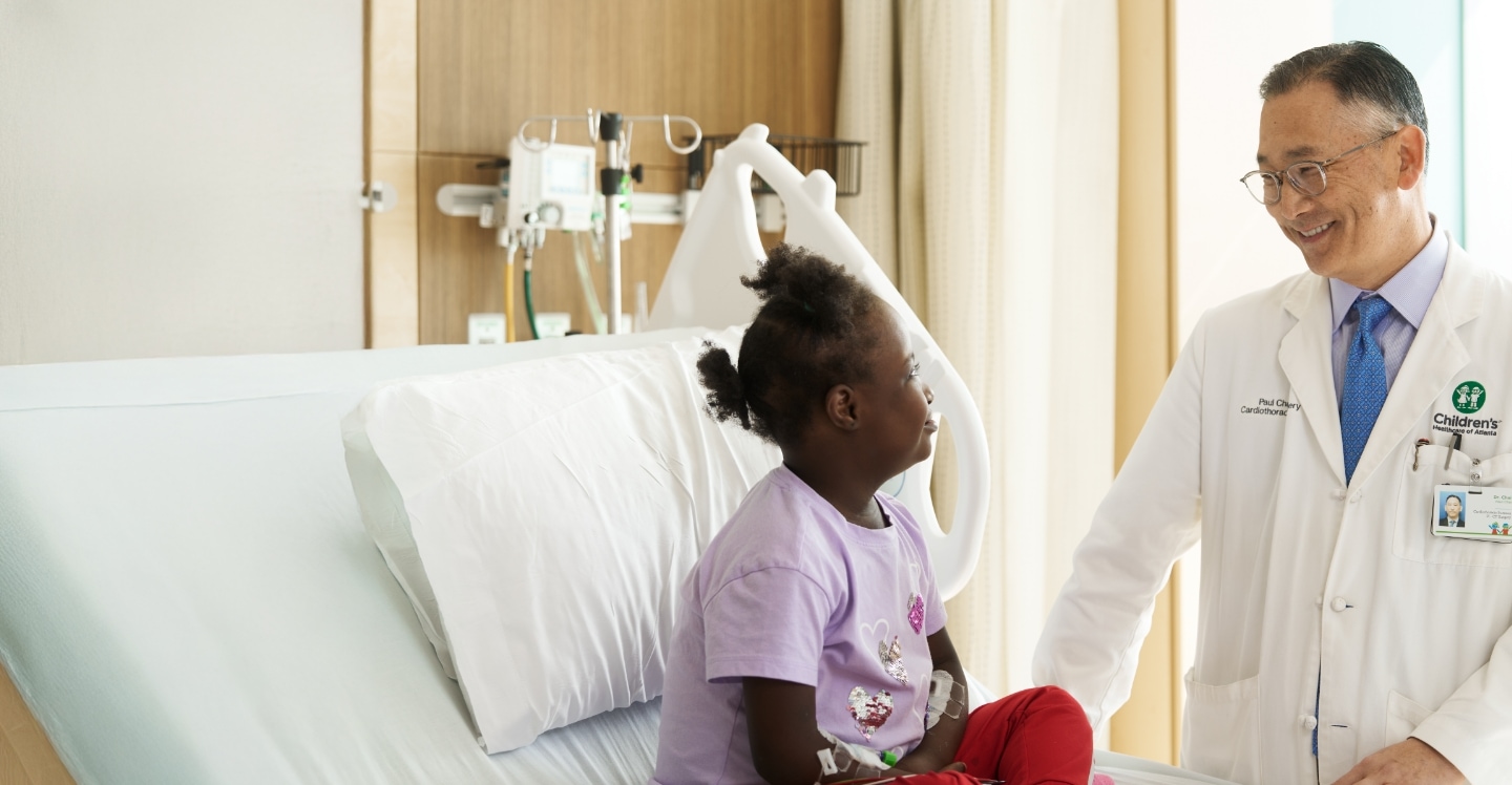 Doctor examines child's heart health