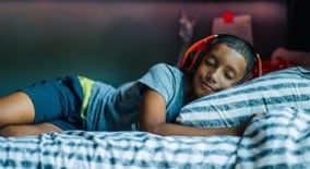 boy listens to music