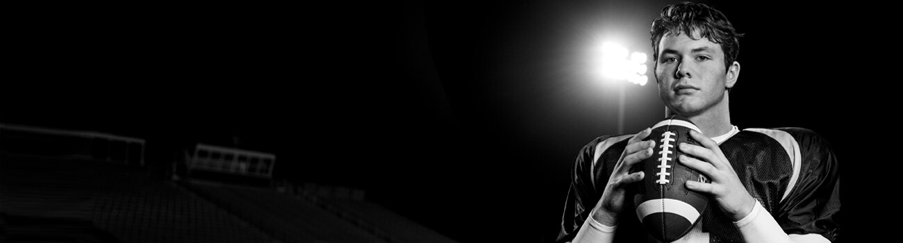 teen sports medicine football player