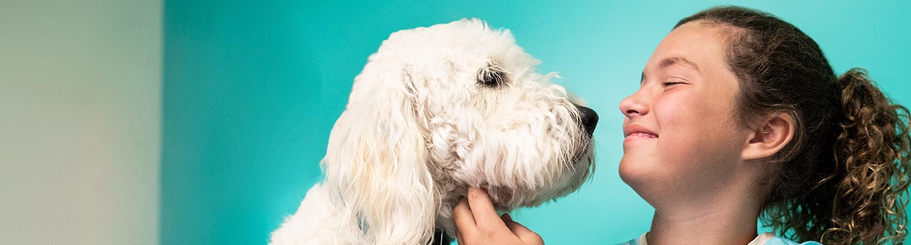 Girl with Children's Healthcare of Atlanta therapy dog