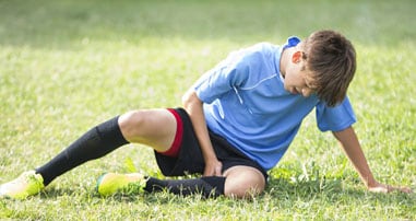 teen with injury from overuse playing soccer