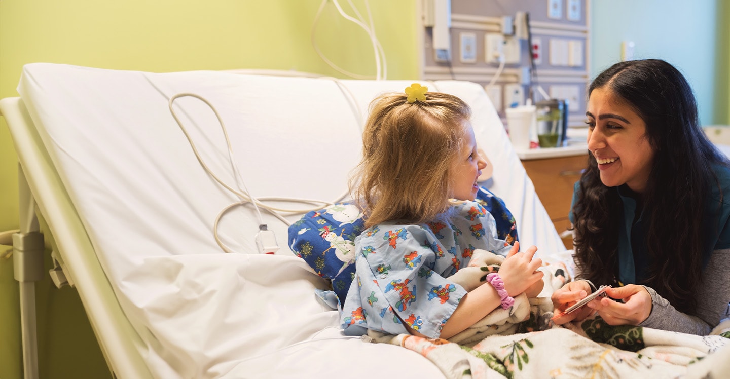 Patient and nurse smiling and talking